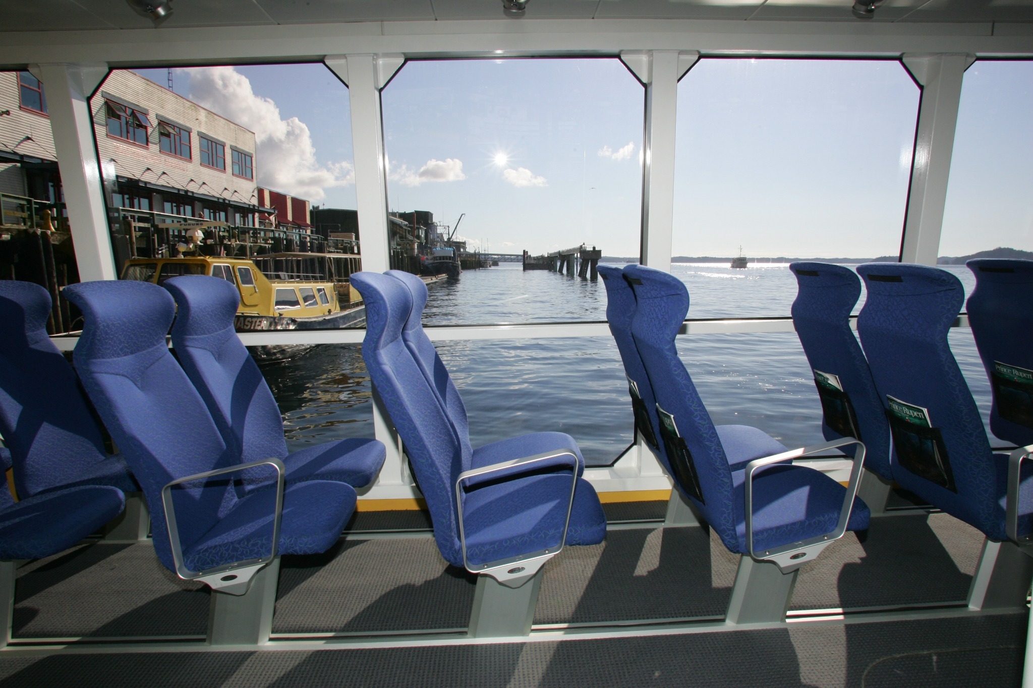 Floor-to-ceiling windows inside the M/V Inside Passage catamaran